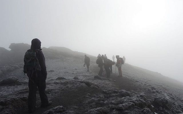 The bitter cold at the summit. Clouds covered my view, though it warmed up after the sun rose. (Melanie Lidman/Times of Israel) The bitter cold at the summit. Clouds covered my view, though it warmed up after the sun rose. (Melanie Lidman/Times of Israel)