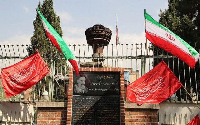Iranian flags flutter above religious banners during the inauguration of an anti-American plaque displayed outside the former American embassy in Tehran on September 2, 2015. (Atta Kenare /AFP) Iranian flags flutter above religious banners during the inauguration of an anti-American plaque displayed outside the former American embassy in Tehran on September 2, 2015. (Atta Kenare /AFP)
