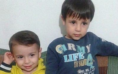 This handout photo courtesy of Tima Kurdi shows Aylan Kurdi, left, and his brother Galib Kurdi. The body of 3-year-old Syrian Aylan Kurdi was found on a Turkish beach after the small rubber boat he, his 5-year old brother Galib and their mother, Rehan, were in capsized during a desperate voyage from Turkey to Greece. (Photo courtesy of Tima Kurdi /The Canadian Press via AP)