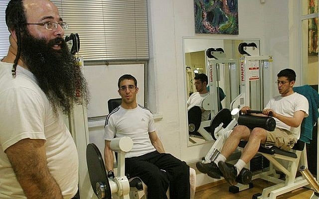 Illustrative: Ultra-Orthodox Jewish man exercises at a gym in the "Kosher Gym" in Jerusalem, Oct 16, 2007. (Orel Cohen/Flash90) Illustrative: Ultra-Orthodox Jewish man exercises at a gym in the "Kosher Gym" in Jerusalem, Oct 16, 2007. (Orel Cohen/Flash90)