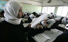 Female students in a classroom in Rafah, southern Gaza Strip, March 2009 [Abed Abed/Flash90]