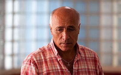 Mordechai Vanunu, an Israeli former nuclear technician who revealed details of Israel's nuclear weapons program to the British press, sits in the Supreme Court in Jerusalem, June 06, 2012. (Uri Lenz / FLASH90) 