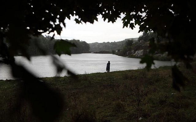 Illustrative photo of an ultra Orthodox Jewish man seen near the banks of the Umanka River in Uman, Ukraine, September 4, 2013. (Yaakov Naumi/Flash90) Illustrative photo of an ultra Orthodox Jewish man seen near the banks of the Umanka River in Uman, Ukraine, September 4, 2013. (Yaakov Naumi/Flash90)