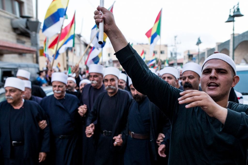 File: Israeli Druze from the village of Yarka attend a demonstration in support of their brethren in Syria threatened by fighting in that country's civil war, June 14, 2015. (Basel Awidat/Flash90) File: Israeli Druze from the village of Yarka attend a demonstration in support of their brethren in Syria threatened by fighting in that country's civil war, June 14, 2015. (Basel Awidat/Flash90)