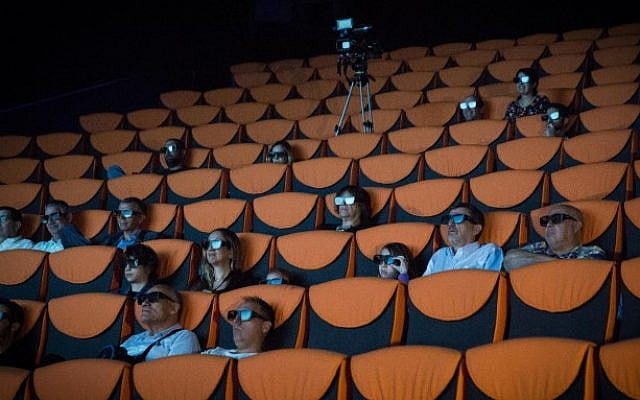 People enjoy a sample Imax screening at the new Yes Planet cinema, before opening in Jerusalem, on August 11, 2015. Yes Planet, in the mixed Arab/Jewish neighborhood of Abu Tor, is open on Shabbat. (Hadas Parush/Flash90). People enjoy a sample Imax screening at the new Yes Planet cinema, before opening in Jerusalem, on August 11, 2015. Yes Planet, in the mixed Arab/Jewish neighborhood of Abu Tor, is open on Shabbat. (Hadas Parush/Flash90)