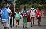 Children arrive for their first day of school at the Paula Ben Gurion school in Jerusalem on September 1, 2015. (Hadas Parush/Flash 90)