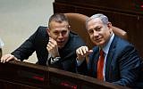 Prime Minister Benjamin Netanyahu (right) speaks with Public Security Minister Gilad Erdan (left) at the Knesset in Jerusalem on September 7, 2015. (Yonatan Sindel/ Flash90)