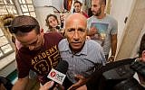 Mordechai Vanunu speaks to the media at the Jerusalem Magistrate's Court, September 10, 2015. (Yonatan Sindel/Flash90)