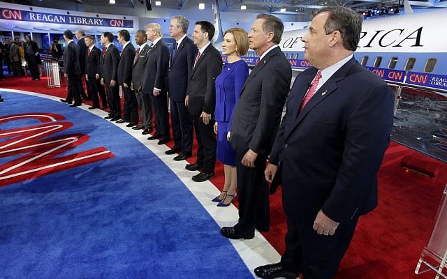 Republican presidential candidates, from left, former Pennsylvania Sen. Rick Santorum, former New York Gov. George Pataki, Sen. Rand Paul, R-Ky., former Arkansas Gov. Mike Huckabee, Sen. Marco Rubio, R-Fla., Sen. Ted Cruz, R-Texas, retired neurosurgeon Ben Carson, businessman Donald Trump, former Florida Gov. Jeb Bush, Wisconsin Gov. Scott Walker, businesswoman Carly Fiorina, Ohio Gov. John Kasich, and New Jersey Gov. Chris Christie take the stage during the CNN Republican presidential debate at the Ronald Reagan Presidential Library and Museum on Wednesday, Sept. 16, 2015, in Simi Valley, Calif. (AP Photo/Chris Carlson)