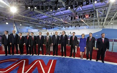Republican presidential candidates, from left, former Pennsylvania Sen. Rick Santorum, former New York Gov. George Pataki, Sen. Rand Paul, R-Ky., former Arkansas Gov. Mike Huckabee, Sen. Marco Rubio, R-Fla., Sen. Ted Cruz, R-Texas, retired neurosurgeon Ben Carson, businessman Donald Trump, former Florida Gov. Jeb Bush, Wisconsin Gov. Scott Walker, businesswoman Carly Fiorina, Ohio Gov. John Kasich, and New Jersey Gov. Chris Christie take the stage during the CNN Republican presidential debate at the Ronald Reagan Presidential Library and Museum on Wednesday, Sept. 16, 2015, in Simi Valley, Calif. (AP Photo/Chris Carlson)
