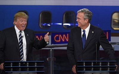 Republican presidential candidate, former Florida Gov. Jeb Bush, right, watches as Donald Trump speaks during the CNN Republican presidential debate at the Ronald Reagan Presidential Library and Museum on Wednesday, Sept. 16, 2015, in Simi Valley, Calif. (AP Photo/Mark J. Terrill) 