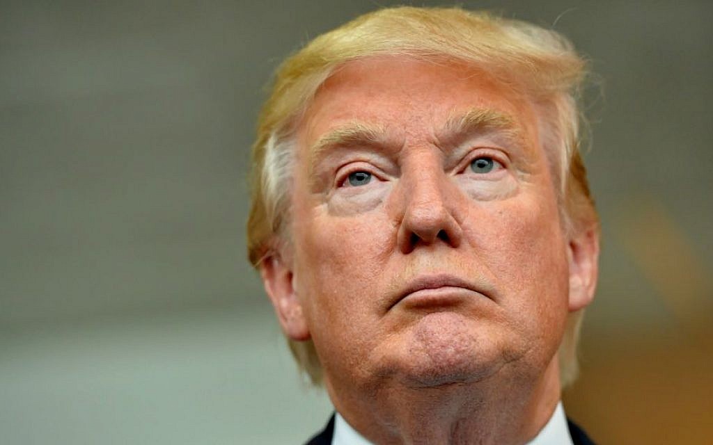 Republican presidential candidate Donald Trump listens during a news conference after speaking at the TD Convention Center in Greenville, South Carolina, August 27, 2015 (AP Photo/Richard Shiro) Republican presidential candidate Donald Trump listens during a news conference after speaking at the TD Convention Center in Greenville, South Carolina, August 27, 2015 (AP Photo/Richard Shiro)
