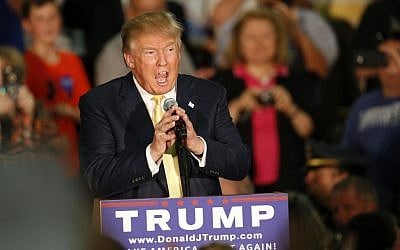 Republican presidential candidate Donald Trump calls for a 'total and complete shutdown' of Muslims entering the US, December 7, 2015. (AP Photo/Robert F. Bukaty)