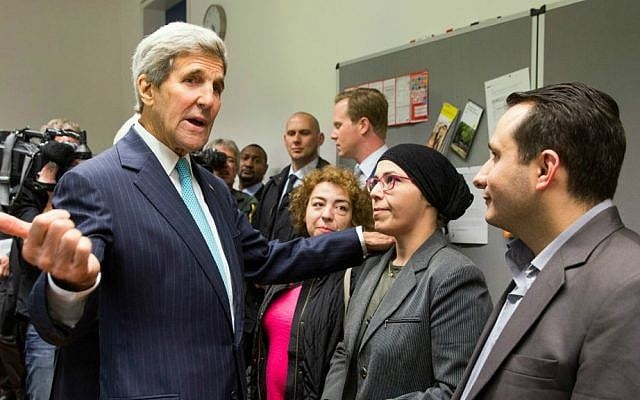 Then-US Secretary of State John Kerry meets with Syrian refugees in Berlin, Germany, September 20, 2015. (AP/Evan Vucci, Pool) Then-US Secretary of State John Kerry meets with Syrian refugees in Berlin, Germany, September 20, 2015. (AP/Evan Vucci, Pool)