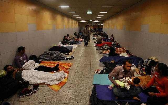 Asylum seekers sleep at Keleti underground railway station in Budapest, Hungary, Sept. 4, 2015. (AP/Frank Augstein)