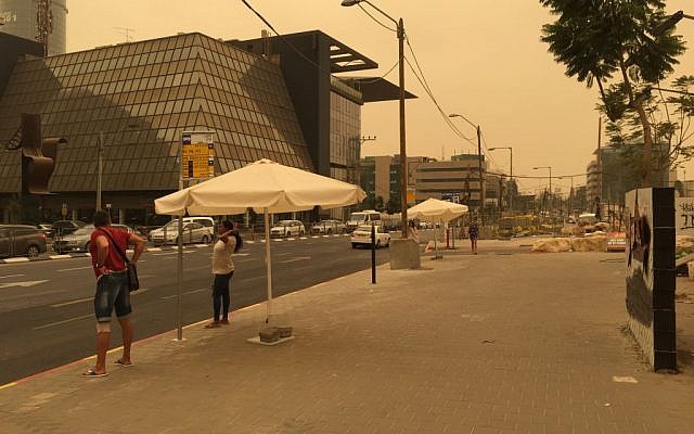 Illustrative: Heavy dust turns the Tel Aviv sky orange at midday on September 8, 2015, in the worst sandstorm yet recorded in the country. (Times of Israel) Illustrative: Heavy dust turns the Tel Aviv sky orange at midday on September 8, 2015, in the worst sandstorm yet recorded in the country. (Times of Israel)