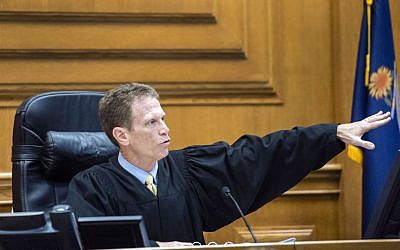 District Court Judge Kelly Ryan admonishes Frazier Glenn Miller for his courtroom behavior after Miller after was found guilty of one count of capital murder, three counts of attempted murder and assault and weapons charges on Monday, August 31, 2015, in the Johnson County Courthouse in Olathe, Kansas. (Allison Long/The Kansas City Star via AP, Pool) District Court Judge Kelly Ryan admonishes Frazier Glenn Miller for his courtroom behavior after Miller after was found guilty of one count of capital murder, three counts of attempted murder and assault and weapons charges on Monday, August 31, 2015, in the Johnson County Courthouse in Olathe, Kansas. (Allison Long/The Kansas City Star via AP, Pool)