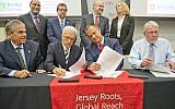 MK Erel Margalit, (R)  and Rutgers Food Innovation Center Director Lou Cooperhouse at the signing ceremony at Rutgers University in New Brunswick, New Jersey, Friday, September 18, 2015.  (Ron Sachs)