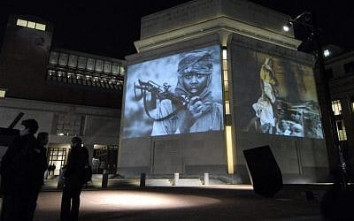 Illustrative: Images from Darfur and Chad are projected on the exterior walls of the United States Holocaust Memorial Museum in Washington, DC. (AP/Nick Wass)