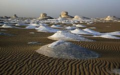 This photo shows a view of the Egyptian White desert, about 500 kilometers (310 miles) southwest of Cairo, Egypt. At least 12 people were killed and 10 injured in Egypt's southwestern desert Sunday, Sept 13, 2015, when security forces mistakenly fired on a group of Mexican tourists, Egyptian officials said. The Mexican Foreign Ministry confirmed the incident and said at least two of the dead were Mexican nationals. (AP Photo/Manoocher Deghati, File)