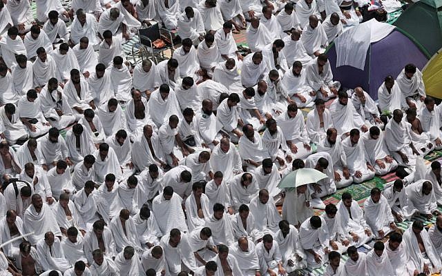 Muslim pilgrims pray outside Namira mosque in Arafat, on the second and most significant day of the annual hajj pilgrimage, near the holy city of Mecca, Saudi Arabia, Wednesday, September 23, 2015. (AP/Mosa'ab Elshamy) Muslim pilgrims pray outside Namira mosque in Arafat, on the second and most significant day of the annual hajj pilgrimage, near the holy city of Mecca, Saudi Arabia, Wednesday, September 23, 2015. (AP/Mosa'ab Elshamy)