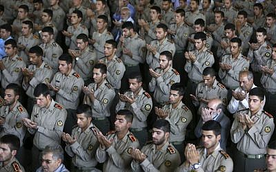 Iranian army cadets perform their Friday prayer at the Tehran university campus, Friday, Sept. 25, 2015.  (AP Photo/Vahid Salemi)
