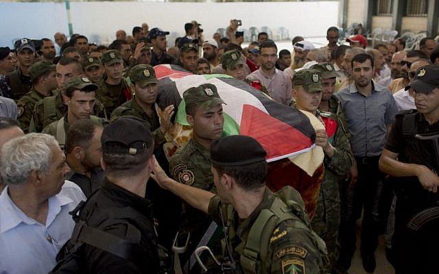 Palestinian security officers carry the body of Riham Dawabsha, 27, during her funeral procession in the West Bank village of Duma, near Nablus, Monday, Sept. 7, 2015. (AP/Nasser Nasser) Palestinian security officers carry the body of Riham Dawabsha, 27, during her funeral procession in the West Bank village of Duma, near Nablus, Monday, Sept. 7, 2015. (AP/Nasser Nasser)