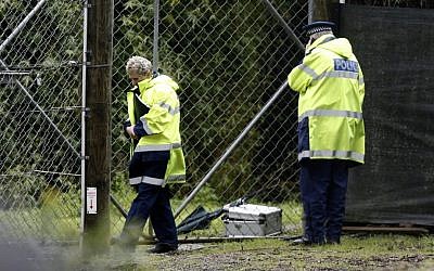 Police stand at the shut gates at Hamilton Zoo after a female zookeeper was killed by one of the tigers at the zoo in Hamilton, New Zealand Sunday Sept. 20, 2015. (Nick Reed/New Zealand Herald via AP) Police stand at the shut gates at Hamilton Zoo after a female zookeeper was killed by one of the tigers at the zoo in Hamilton, New Zealand Sunday Sept. 20, 2015. (Nick Reed/New Zealand Herald via AP)