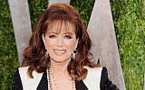In this Feb. 24, 2013 file photo, author Jackie Collins arrives at the 2013 Vanity Fair Oscars Viewing and After Party in West Hollywood, Calif. (Evan Agostini/Invision/AP, File)