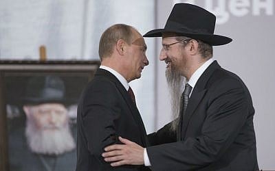 Russian President Vladimir Putin, left, is greeted by Russia’s Chief Rabbi Berel Lazar in Moscow, June 13, 2013. (Alexander Zemlianichenko/AP Images/via JTA) Russian President Vladimir Putin, left, is greeted by Russia’s Chief Rabbi Berel Lazar in Moscow, June 13, 2013. (Alexander Zemlianichenko/AP Images/via JTA)