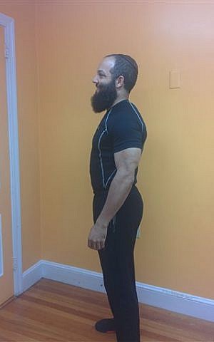 In this July 12, 2015, photo provided by Rabbi Yosef Kulek, Kulek poses for a photo in Hartford, Conn. Kulek is shown a year after he began a fitness program that provided campus rabbis with online support and covered half the cost of a personal trainer for six months. Kulek, who directs a center for Jewish students at the University of Hartford, lost 22 pounds and six pants sizes after a year of regular exercise. (Devora Kulek/Rabbi Yosef Kulek via AP) In this July 12, 2015, photo provided by Rabbi Yosef Kulek, Kulek poses for a photo in Hartford, Conn. Kulek is shown a year after he began a fitness program that provided campus rabbis with online support and covered half the cost of a personal trainer for six months. Kulek, who directs a center for Jewish students at the University of Hartford, lost 22 pounds and six pants sizes after a year of regular exercise. (Devora Kulek/Rabbi Yosef Kulek via AP)