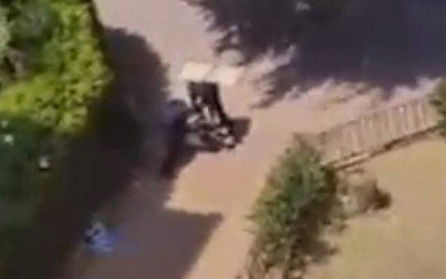 An image taken from video footage apparently showing two policeman tasering an Ethiopian Israeli man during a routine arrest in Ramle on September 3, 2015. Police have vowed to investigate. (screen capture: Channel 2) An image taken from video footage apparently showing two policeman tasering an Ethiopian Israeli man during a routine arrest in Ramle on September 3, 2015. Police have vowed to investigate. (screen capture: Channel 2)