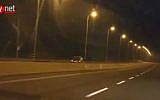 Footage of vehicle traveling against the direction of traffic on Highway 2 north of Tel Aviv, early Tuesday, September 8, 2015. (screen capture/Ynet)