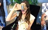 Playing with a Gemsense-controlled device (Courtesy)