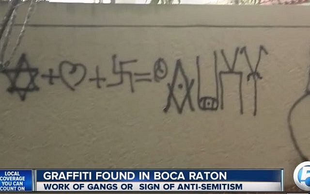Anti-Semitic graffiti found outside a Florida complex, September 2015. (YouTube screenshot)