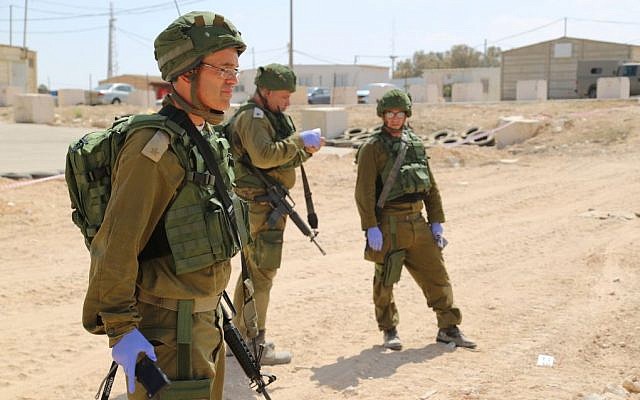 Maj. res.) Doron Herman with two other members of the IDFs missing person unit during a drill Eric Cortellessa/ Times of Israel) Maj. res.) Doron Herman with two other members of the IDFs missing person unit during a drill Eric Cortellessa/ Times of Israel)