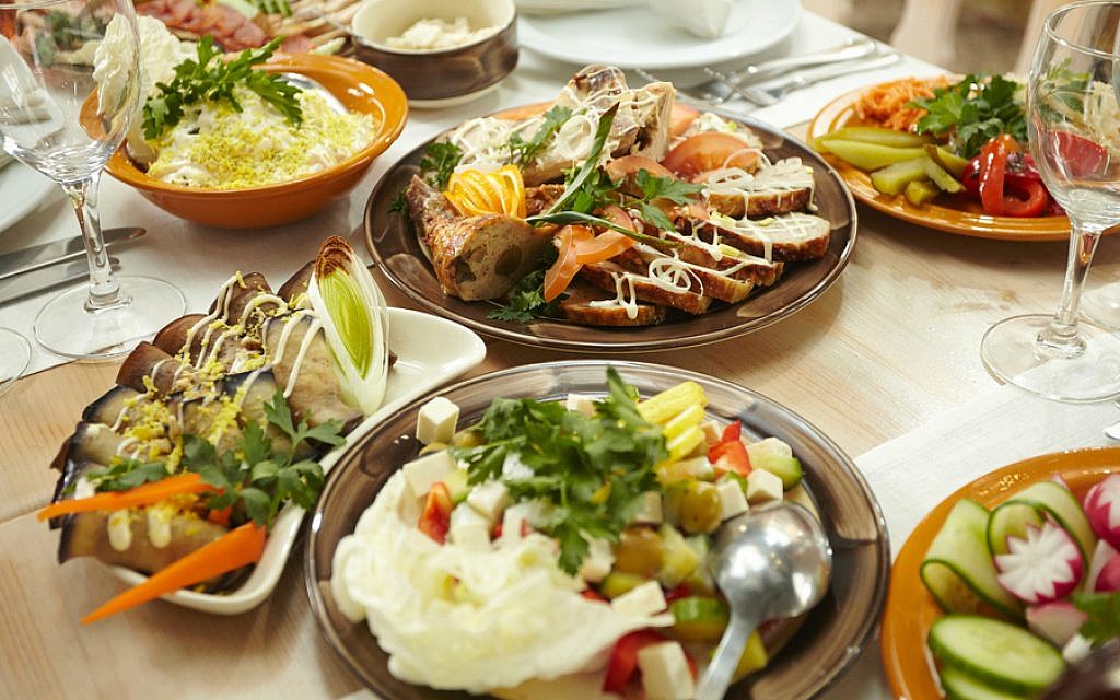 Israelis abroad no longer need eat alone on holidays. (Shutterstock/via JTA) Israelis abroad no longer need eat alone on holidays. (Shutterstock/via JTA)