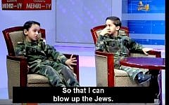 A Hamas-run TV station in Gaza interviews two young boys aspiring to wage Jihad against Israel and 'blow up the Jews.' (screen grab: YouTube)