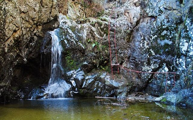 An image of the trail at Valea lui Stan, a narrow valley with huge cliffs and natural streams in Romania's Fagaras Mountains. An image of the trail at Valea lui Stan, a narrow valley with huge cliffs and natural streams in Romania's Fagaras Mountains.