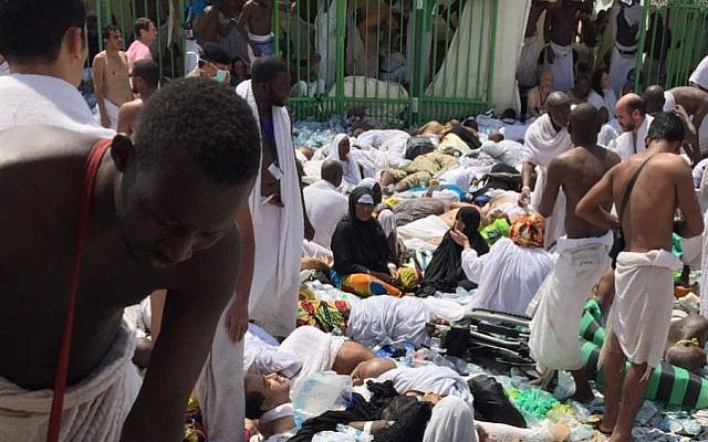 Illustrative: Muslim pilgrims gather around the victims of a stampede in Mina, Saudi Arabia during the annual hajj pilgrimage on Sept. 24, 2015. (AP) Illustrative: Muslim pilgrims gather around the victims of a stampede in Mina, Saudi Arabia during the annual hajj pilgrimage on Sept. 24, 2015. (AP)