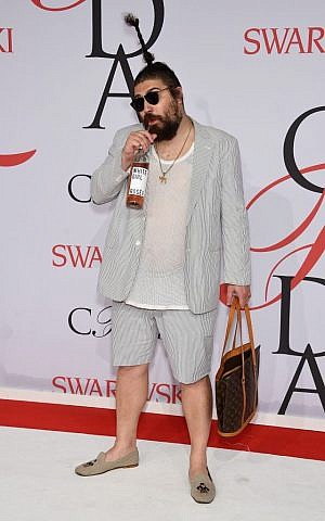 The Fat Jew sipping his own brand of wine in New York City, June 1, 2015. (Dimitrios Kambouris/Getty Images/via JTA)
