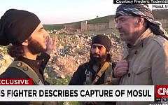 Screenshot from a CNN report showing footage of Jürgen Todenhöfer with Islamic State fighters in Syria in 2014. (Screenshot/CNN)