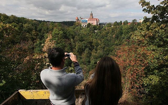 A German tourist takes picture of Ksiaz Castle, under which the Nazi gold train is said to be hidden, in Walbrzych, Poland, on Wednesday, September 2, 2015. (Czarek Sokolowski/AP Photo) A German tourist takes picture of Ksiaz Castle, under which the Nazi gold train is said to be hidden, in Walbrzych, Poland, on Wednesday, September 2, 2015. (Czarek Sokolowski/AP Photo)