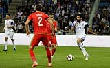 Omri Ben Harush from the Israeli team fights for the ball during the Euro 2016 qualifying football match between Israel and Wales at the Sammy Ofer Stadium in Haifa, on March 28, 2015. (Flash90)