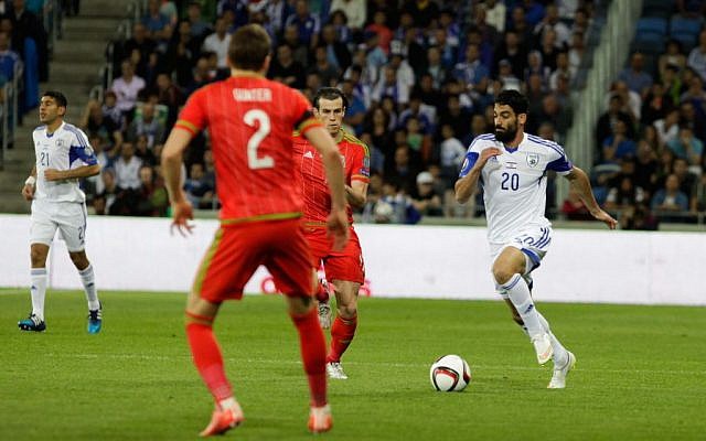 Omri Ben Harush from the Israeli team fights for the ball during the Euro 2016 qualifying football match between Israel and Wales at the Sammy Ofer Stadium in Haifa, on March 28, 2015. (Flash90) Omri Ben Harush from the Israeli team fights for the ball during the Euro 2016 qualifying football match between Israel and Wales at the Sammy Ofer Stadium in Haifa, on March 28, 2015. (Flash90)