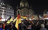 Supporters of the far-right PEGIDA movement attend a protest rally on October 5, 2015 in Dresden, eastern Germany (Tobias Schwarz/AFP)