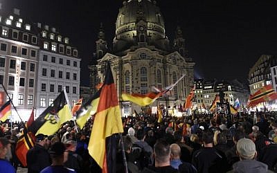 Supporters of the far-right PEGIDA movement attend a protest rally on October 5, 2015 in Dresden, eastern Germany (Tobias Schwarz/AFP)