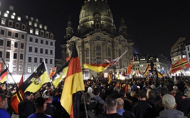 Supporters of the far-right PEGIDA movement attend a protest rally on October 5, 2015 in Dresden, eastern Germany (Tobias Schwarz/AFP) Supporters of the far-right PEGIDA movement attend a protest rally on October 5, 2015 in Dresden, eastern Germany (Tobias Schwarz/AFP)