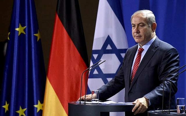 Prime Minister Benjamin Netanyahu attends a joint press conference with the German chancellor at the chancellery in Berlin on October 21, 2015 (AFP PHOTO/TOBIAS SCHWARZ) Prime Minister Benjamin Netanyahu attends a joint press conference with the German chancellor at the chancellery in Berlin on October 21, 2015 (AFP PHOTO/TOBIAS SCHWARZ)