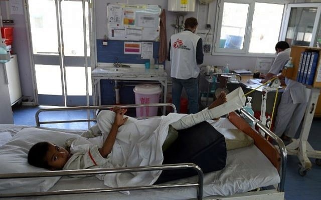 In this file photograph from May 21, 2015, an Afghan child receives treatment at the Medecins Sans Frontieres (MSF), or Doctors Without Borders, hospital in the northern city of Kunduz, after being wounded in a fight between the Taliban and Afghan security forces. (AFP PHOTO/SHAH Marai/FILES) In this file photograph from May 21, 2015, an Afghan child receives treatment at the Medecins Sans Frontieres (MSF), or Doctors Without Borders, hospital in the northern city of Kunduz, after being wounded in a fight between the Taliban and Afghan security forces. (AFP PHOTO/SHAH Marai/FILES)